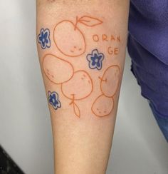 an orange and blue tattoo on the left arm with words that read organ ge written below it