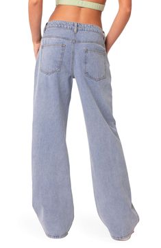 Low-slung, nonstretch jeans are crafted with puddling hems and turned to a dreamy shade of washed-out blue. 100% cotton Machine wash, line dry Imported College Going Out Outfits, Visionary Fashion, Low Waisted Jeans, Jeans Low Rise, Girl Closet, Going Out Outfits, Washed Denim, Low Rise Jeans, Party Tops