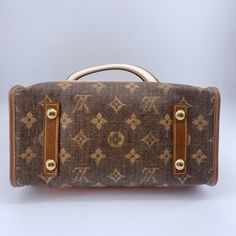 Louis Vuitton Tisse Sac Handbag Limited Edition Monogram Rayures PM PH6839 Product Details Size: L 29cm, H 25cm, D 14cm, Handle 43cm L 11.5'', H 10'', D 5.5'', Handle:17'' Colour: Brown & orange Accessory: Dust bag Condition: Excellent Sub-category: Handbag Please Note: All products in our store are second-hand and vintage. ITEM LOCATION IS CANADA. Duties are set by the destination country/province's customs authorities. We are not responsible for paying any duties. These are the actual photos o Orange Accessories, Burberry Bag, Fendi Bags, Handbag Backpack, Kids Bags, Bottega Veneta, Chanel Bag, Fashion Games, Backpack Bags