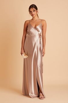 a woman in a long metallic dress