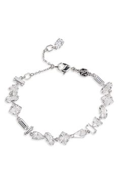 A medley of mixed-cut crystals extends the sophisticated appeal of this elegant rhodium-plated bracelet with a dangling crystal charm. 8" length; 1/4" width Rhodium plate/Swarovski crystal Imported La Mer Moisturizing Cream, Bracelet In Silver, Crystal Charm, Crystal Bracelet, Moisturizer Cream, Crystal Bracelets, Swarovski Crystal, Rhodium Plated, Swarovski Crystals