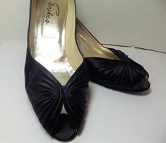 "1980s Vintage Evins Kitten Heels Pumps Open Toe Shoes Dark Navy Satin Made in Italy 9AA Vintage open-toe pumps by Evins. Navy blue satin with ruching at toe. Leather soles. The kitten heels measure 2.1\" H. Size 9 AA. Made in Italy." Low Heel Pumps, Straw Clutch, Kitten Heel Pumps, Open Toe Shoes, Heels Pumps, Blue Satin, Toe Shoes, 1980s Vintage, Chanel Ballet Flats