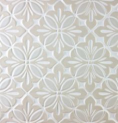 a close up view of the white flower pattern