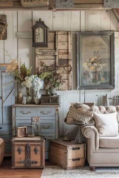 a living room filled with furniture and lots of pictures hanging on the wall above it