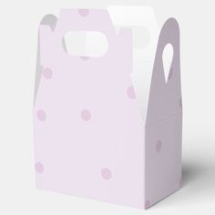 a pink and white box with polka dots on it