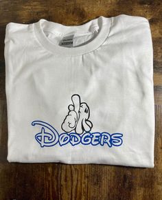 La Dodgers tee  screen printed on 100%cotten gildan t-shirt Pre-shrunk Band Merch T-shirt For Fan Conventions, Graphic Print Crew Neck T-shirt For Fans, Fan Apparel T-shirt With Front Print, Graphic Tee With Front Print In Ring-spun Cotton, Front Print Cotton T-shirt For Fan Gear, Cotton T-shirt With Front Print For Fans, Graphic Tee With Front Print And Crew Neck, Graphic Tee With Sublimation Front Print, Graphic Tee Sublimation With Front Print