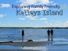 two people standing on the beach looking out at the water with text reading exploring family friendly kettleys island