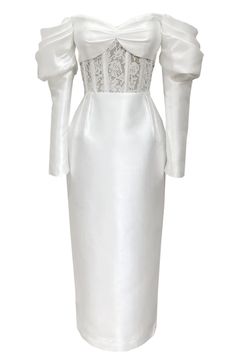 a white dress with long sleeves and lace on the bust, it is very elegant