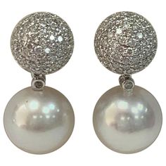 Metal; 18k white Gold Pearl Size: 12-13mm White Gold Pearl quality: AAA Pearl Luster: AAA Excellent Nature: South Sea Cultured Pearl Nacre : Very Thick Diamond Weight; 2.56 Cts. Diamond Color: G+