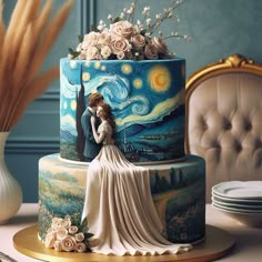 a wedding cake decorated with an image of a woman and the starry night painted on it