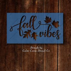 a wooden sign that says fall vibes on it