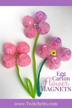 three pink flowers made out of candy wrappers on a white background with the words egg carton flower magnets