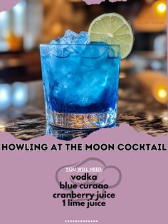 a blue curacade cocktail with lime on the rim