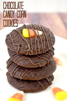 chocolate candy corn cookies stacked on top of each other