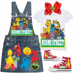 children's sesame street clothing and shoes with red bows on the headbands