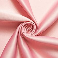 a close up view of pink satin fabric