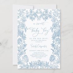 a blue and white floral baby shower card