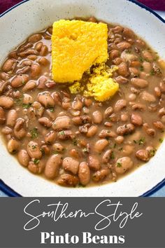 a white bowl filled with beans and cornbread