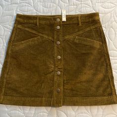 Madewell Skirt Size 6 Corduroy Dark Green/Brown Skirt Brand New With Tag High-waisted Brown Corduroy Skirt, Brown Corduroy Casual Mini Skirt, Casual Brown Corduroy Mini Skirt, Casual Brown Corduroy Skirt, Brown Mini Skirt With Pockets, Brown Mini Skirt For Fall, Brown Cotton Mini Skirt With Relaxed Fit, Brown Corduroy Mini Skirt, Button Front Denim Skirt