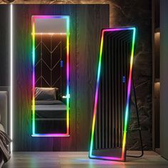 a room with a bed, mirror and neon lights