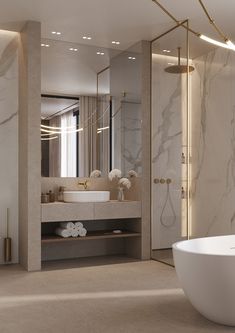 a bathroom with a large white bathtub next to a walk in shower