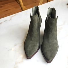 Color Is A Spruce Green/Olive Genuine 100% Suede. Never Worn, Bnwob (Brand New Without Box). Size Us 7.5m, Mint Condition No Flaws, No Marks, No Wear, Perfect! (Photos Aren't Great, But Despite The Bad Photos These Booties Are In Perfect Shape) The Gigietta Bootie From Vince Camuto Will Compliment Any Cool Weather Outfit. This Leather Ankle Boot Features A Pointed Toe, Chunky Block Heel, And Dipped Topline To Keep Any Outfit Right On Trend: Leather Upper Back Zip Closure Pointed Toe Synthetic Li Mint Boots Outfit, Chic Green Closed Toe Boots, Green Suede Spring Boots, Green Suede Boots For Spring, Green Suede Boots With Pointed Toe, Bad Photos, Perfect Photos, Chunky Block Heels, Green Olive