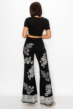 T-Party Soft wide leg flare pants with elastic waistband and floral stamped design. Each pair unique. Length runs a little short. Soft and cozy, feels like you have nothing on. Made in USA. So pretty! Color: Black Sizes: S-M-L-XL Waist 26-28-30-32, Inseam 29-30, fabric is stretchy 93% Micro Modal, 7% Spandex, hand wash or machine cold, made in USAH/MMS75495 Casual Flared Bottoms With Floral Print, Trendy Flared Bottoms With Floral Print, Chic Flared Bottoms With Floral Print, Trendy Flare Bottoms With Floral Print, Black Flare Wide Leg Pants For Spring, Floral Print Flare Bottoms With Stretch, Stretch Black Pants With Floral Print, Chic Flared Floral Print Bottoms, Trendy Flare Pants With Floral Print