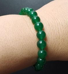 wholesale gemstone bracelet,beaded bracelet1.Material: green jade stone,Elastic thread2.Size of bead:approx  8mm,10mm,12mm,14mm,16mm, in size.length approx, 8", if other length, please tell me.3. this price is one bracelet.4. fit make earring /brooch/pendant/necklace ect jewelry,5.If you have speical requests, I'll be happy to do it for you.6.Returns:I accept returns.1)Send me an email within 7 days and let me know the item is being returned.2)I will refund your money after we recieve our mercha Green Jade Crystal Bracelet With 8mm Beads, Casual Green Crystal Bracelet With 8mm Beads, Green Stretch Bracelet With 8mm Beads, Jade Stretch Bracelet With 8mm Beads, Earring Brooch, Man Bracelet, Elastic Thread, Bracelet Beaded, Pet Necklace