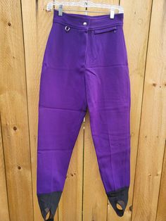 Ski West Vintage Purple Snow Pants 15% Wool Tag Size-Ladies 8 Reg Tag Care- Hand Wash Purple Ski Pants with stirrups. Zipper at front with slide button closure.   Condition-EXCELLENT  Cleaned-YES Approximate Measurements Top to Bottom (minus stirrups)-33.5 inches Top to Bottom of stirrups-39 Top to crotch-12 inches Waist  (cross the front only)-13 inches *Vintage pieces are used, so items will not be in brand new, straight from the manufacturer's condition. Every attempt is made to disclose significant flaws such as hole, rips, stains, excessive piling, faded color, etc. Minor things such as loose thread, slight blemishes may not be stated since some level of wear/tear should be expected in some vintage finds. Pieces are researched to determine an estimate of when produced but an precise t Fitted Full-length Skiing Pants, Fitted Purple Bottoms With Belt Loops, Purple Work Pants With Belt Loops, Purple Workwear Pants With Belt Loops, Violet Vintage, Purple Snow, Peasant Style Dress, Teacher Wardrobe, Purple Vintage