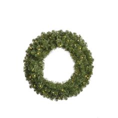 a christmas wreath with lights hanging from it