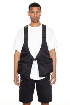 Casual Streetwear Vest With Functional Pockets, Black Casual Vest With Cargo Pockets, Casual Black Vest With Cargo Pockets, Black Nylon Utility Vest, Functional Vest With Pockets For Travel, Utility Black Nylon Vest, Functional Travel Vest With Pockets, Urban Style Vest With Pockets For Outdoor, Urban Style Outdoor Vest With Pockets