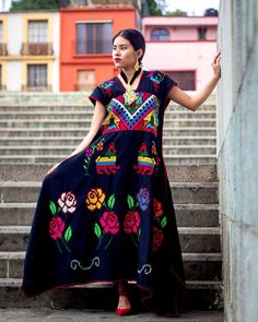 This beautiful floral dress is completely hand embroidered by Mexican artisans, it is ideal for a formal occasion or Bridesmaid in any event, comfortable and beautiful. Una obra de arte  bordado en punto de cruz  por ambos lados. Fits  size  S-M It has hand embroidered flowers  This dress is handmade by Mexican Artisans in San felipe de Usila. We recommend washing by hand with cold water, tender in the shade, to better preserve the original color