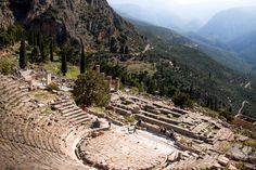 an old theatre in the middle of some mountains