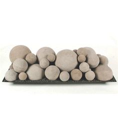 a pile of rocks sitting on top of a black tray