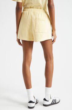 Kick it all weekend in these pull-on cotton shorts that sport the brand's signature. 2" inseam; 29" leg opening; 12" front rise; 15 1/2" back rise (size X-Large) Elastic waist Side-seam pockets 100% cotton Machine wash, tumble dry Made in the USA Asian & Pacific Islander Owned/Founded Disco Shorts, Pacific Islander, Health Club, Sporty And Rich, Platform Slippers, Designer Clothes For Men, Modern Outfits, Women's Summer Fashion, Athletic Women