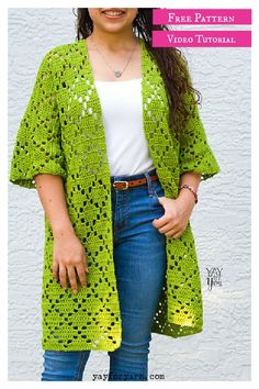 a woman wearing a green crochet cardigan and jeans with her hands in her pockets