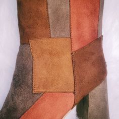 Step into the '70s groove with our Suede Patchwork Platform Boots. These earthy brown shades and retro suede patchwork design are a timeless fashion statement. The platform sole offers both comfort and style, taking you back to the era of flower power and free spirits. Elevate your style and embrace the '70s with every step. Unique Suede Patchwork Design Comfortable Platform Sole Timeless '70s Aesthetic Durable Construction Suede Patchwork, 70s Aesthetic, Earthy Brown, Brown Shades, Patchwork Designs, Platform Boots, Platform Shoes, Free Spirit, Flower Power