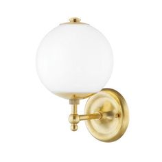 a wall mounted light with a white glass ball on the front and gold metal arm