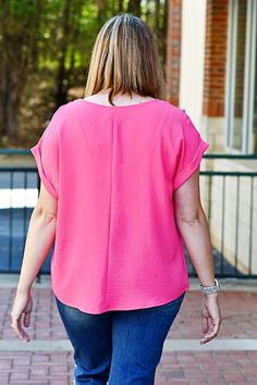 Who doesn't love a pop of color?! Experience effortless style and comfort with our Casual Dolman Sleeve Top in Hot Pink. Made with dolman sleeves and a round neckline, this top is perfect for any casual occasion. Enjoy the beautiful color and non-sheer fabric, making it an essential addition to your wardrobe. ABOUT THIS ITEM: Made in Vietnam. Fabric is 100% Polyester. Hand wash in cold water. Hang or line dry. The Model is 5'9, and wearing a medium. Relaxed Fit Batwing Sleeve Tops For Day Out, Chic Batwing Sleeve Top For Day Out, Spring Batwing Sleeve Tops For Day Out, Spring Day Out Batwing Sleeve Tops, Everyday Tops With Batwing Sleeves, Chic Spring Tops With Batwing Sleeves, Chic Batwing Sleeve Tops For Spring, Chic Tops With Batwing Sleeves For Spring, Crew Neck Tops For Day Out