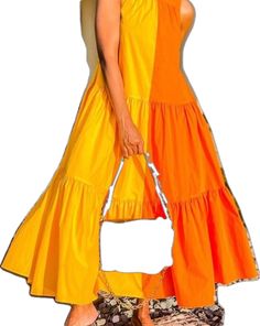 Yellow Ruffled Sundress For Summer, Yellow Ruffled Summer Dress, Yellow Summer Dress With Ruffles, Yellow Ruffled Maxi Sundress, Yellow Maxi Sundress With Ruffles, Yellow Ruffled Dresses For Summer, Orange Summer Midi Dress With Ruffles, Yellow Tiered Sundress For Summer, Yellow Ruffled Beach Dress