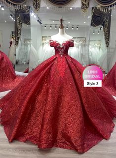 a red ball gown on display in a store