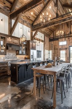 an open kitchen and dining room with wood paneling, chandelier, counter tops, and chairs