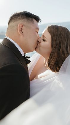 bride and groom sailboat elopement in kelowna, bc