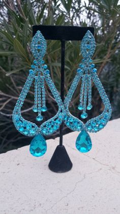 Turquoise Earrings For Evening, Blue Crystal Chandelier Earrings For Party, Glamorous Blue Chandelier Earrings For Party, Turquoise Dangle Chandelier Earrings For Party, Turquoise Drop Crystal Earrings For Party, Light Blue Dangle Crystal Earrings For Party, Light Pink Bridesmaids, Blue Statement Earrings, Aqua Fitness