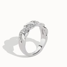 a white gold ring with diamonds on it