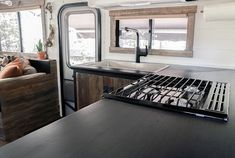 the kitchen and living area of an rv