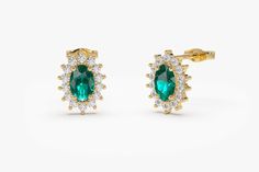 "Emerald Earrings / 14k Oval Cut Emerald Earrings with Diamonds / Natural Emerald Earrings / Mini Emerald Earrings / May Birthstone SOLD AS A PAIR Item Details * Made to Order * Gold Kt: 14K (also available in 18K) * Available Gold Color: Rose Gold, Yellow Gold, White Gold * Round Diamond: 28 pcs 1.2 MM * Oval Emerald: 2 pc 5 x 3 MM * Diamond Carat Weight: 0.23 ctw * Emerald Carat Weight: 0.51 ctw * Diamond Color-Clarity: G Color SI Clarity If you have any additional questions about this ring, j Luxury Green Diamond Halo Earrings, Emerald Earrings Studs, May Birthstone, Diamond Carat, Emerald Earrings, Gorgeous Jewelry, Diamond Color, Natural Emerald, Eternity Bands