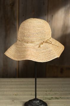 Women's Crushable Raffia Sun Hat | Overland Sheepskin $99 4" brim Beige Packable Hat For Travel, Casual Crochet Bucket Hat For Travel, Bohemian Woven Sun Hat For Travel, Bohemian Straw Sun Hat For Travel, Adjustable Bohemian Straw Hat For Travel, Bohemian Straw Hat For Travel, Packable Brown Hats For Travel, Packable Natural Straw Hat For Travel, Brown Packable Hat For Travel