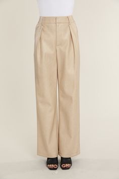 Elevate your professional outfits (or even just your everyday looks) with an edgy wardrobe staple like our Faux Leather Wide Leg Trouser Pants. Tailored to perfection, these wide legged trousers offer a relaxed yet polished vibe, ideal for curating a smart casual look. The sleek faux leather material lends a modern edge, while the wide leg cut ensures a comfortable, airy feel. Pair these with a crisp blouse or a casual tee to create versatile looks that transition effortlessly from office hours Edgy Wardrobe, Wide Legged Trousers, Pants Tailored, Professional Outfits, Casual Tee, Trouser Pants, Cool Suits, Smart Casual, Leather Material