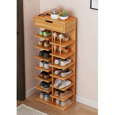 a wooden shoe rack with several pairs of shoes on it